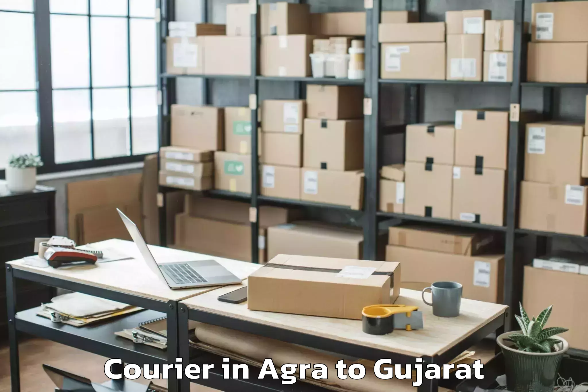 Book Agra to Bhiloda Courier Online